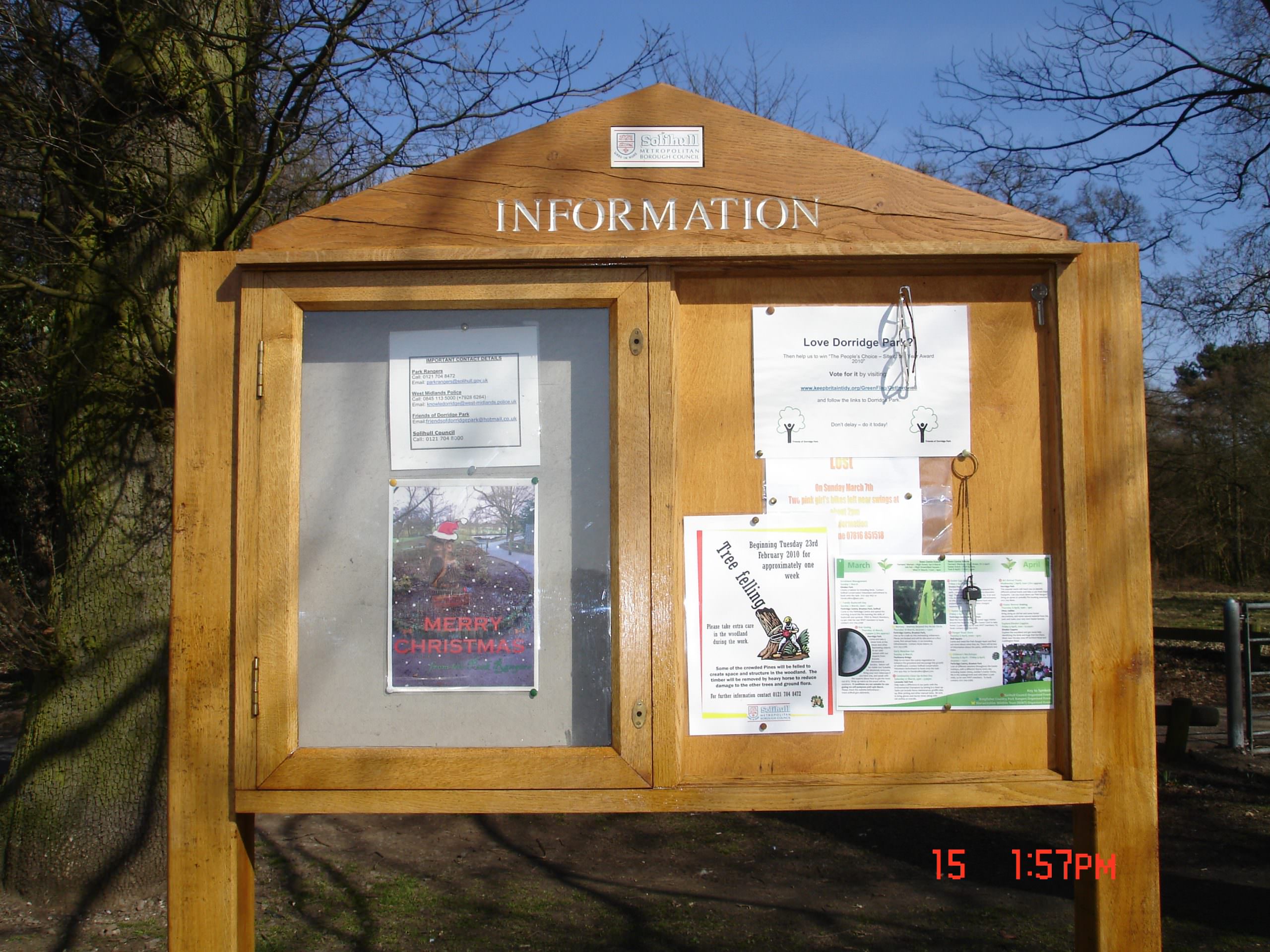 An oak welcome sign for a rural nature reserve. One half consists of a lockable notice board and the other an open pinboard. Posts & header panel.