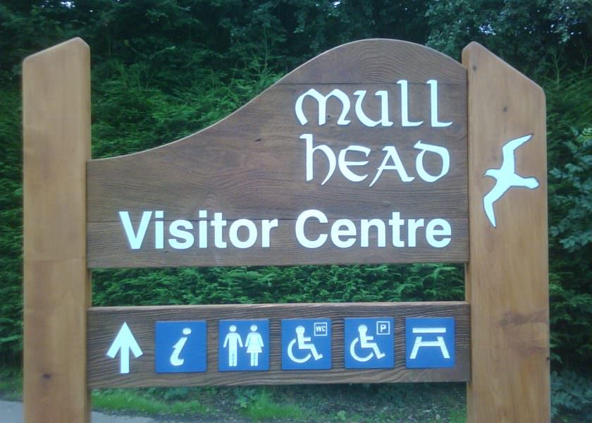 A sandblasted timber nature reserve entrance sign – supplied with 2 shaped planks, sandblasted text and a bird illustration on one post