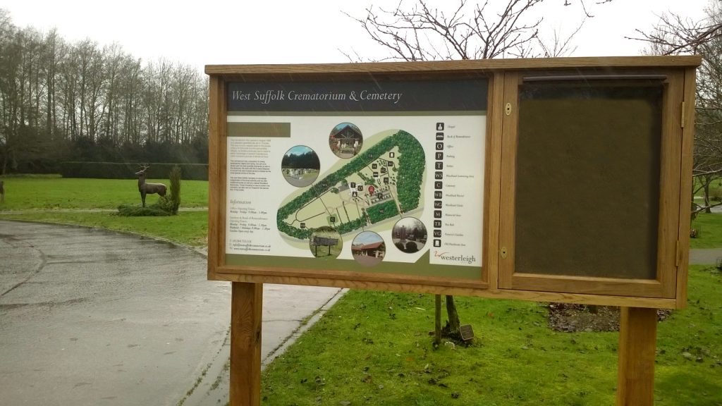 Cemetery sign with notice board